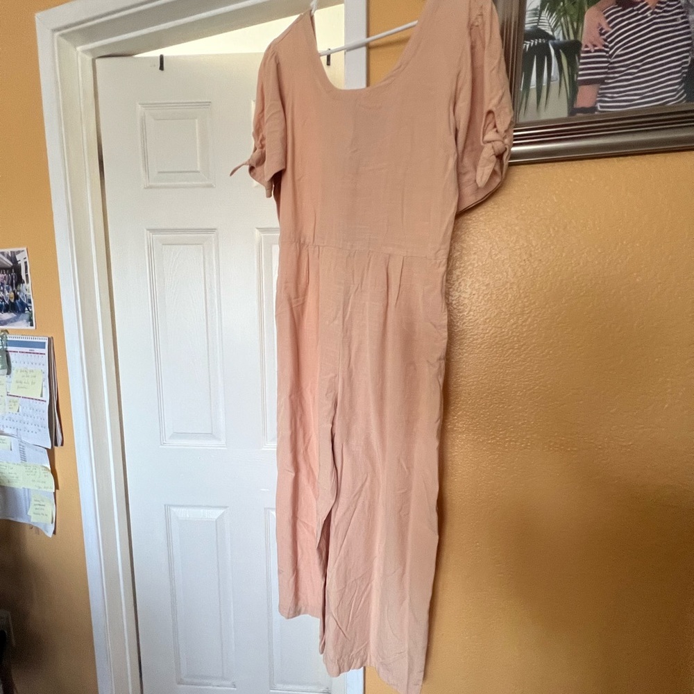Jumpsuit. Worn once. Color: peach
